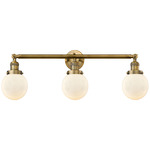 Beacon Bathroom Vanity Light - Brushed Brass / Matte White