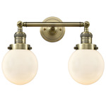 Beacon Bathroom Vanity Light - Antique Brass / Matte White