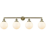 Beacon Bathroom Vanity Light - Antique Brass / Matte White